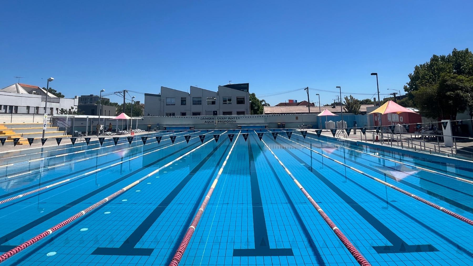 Swimmer training laps in a pool